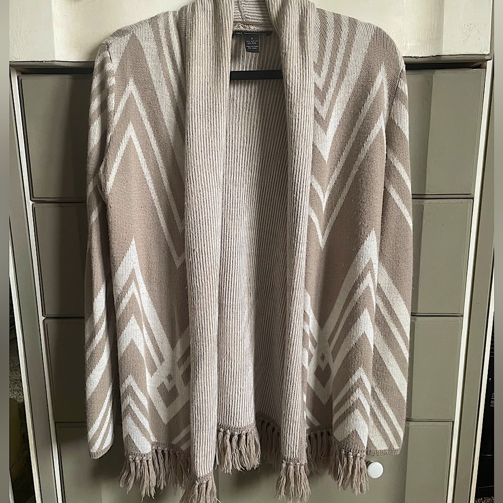 Soft knit sweater with fringe